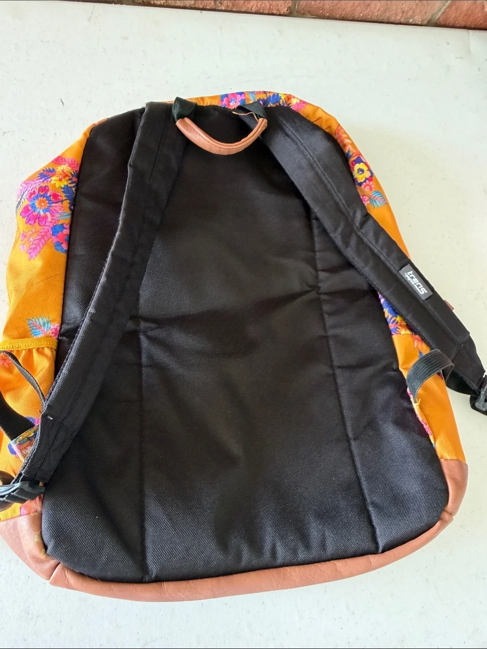 Jansport Kids Floral Backpack in Mustard Yellow with Pink & Blue Accents